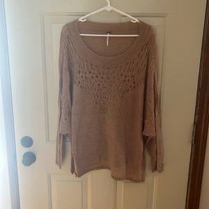 Medium Light women’s long sleeve blouse. Brand: free people.